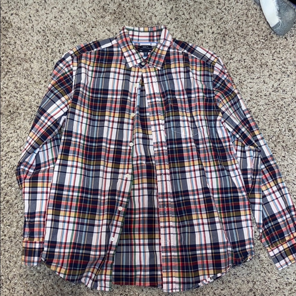 Long sleeved collared shirt.